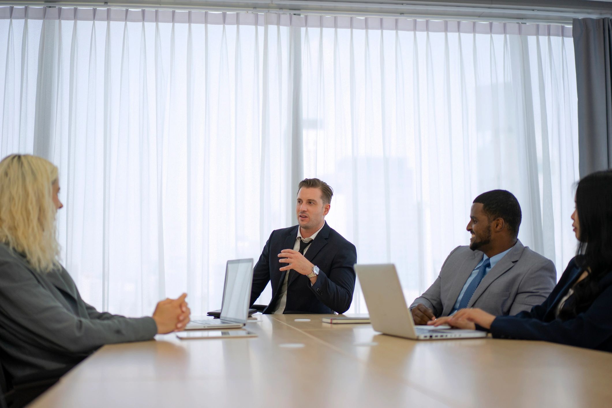 Business team collaborating in a modern meeting room